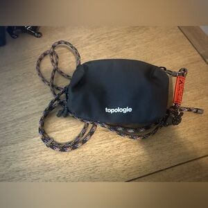 Topologie Mini Bottle Sacoche Black Crossbody Pouch with Multicolor Rope Strap